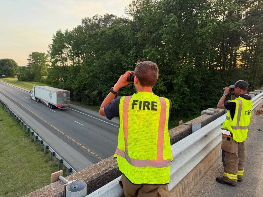 Gaston Fire & Rescue volunteers on standby during a highway response, showing flexible call-based service
